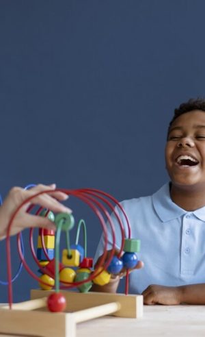 little-boy-having-occupational-therapy-session-with-psychologist-1024x683